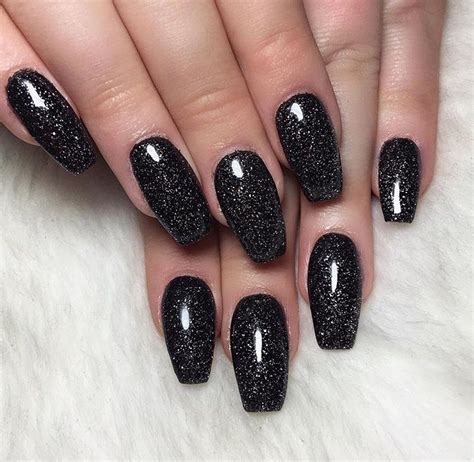 Floral Fantasy. . Black sparkle acrylic nails
